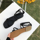 SUOJIALUN New Fashion Women Sandals Flat Heel Narrow Band Back Strap Summer Gladiator Shoes Ladies Casual Summer Beach Slides