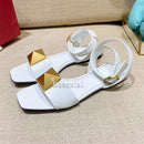 The Rivet Artisan Sandal: Genuine Leather Flat with Statement Buckle