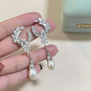 N Kronprinzessin mit 925 Sterling Silber vergoldeten Engelsflügeln 9-10MM Natur hochwertigen Süßwasserperlen Ohrhängern