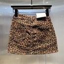 New short skirt 2025 summer American fashion elastic coffee leopard print denim hip skirt hot girl patch small short skirt