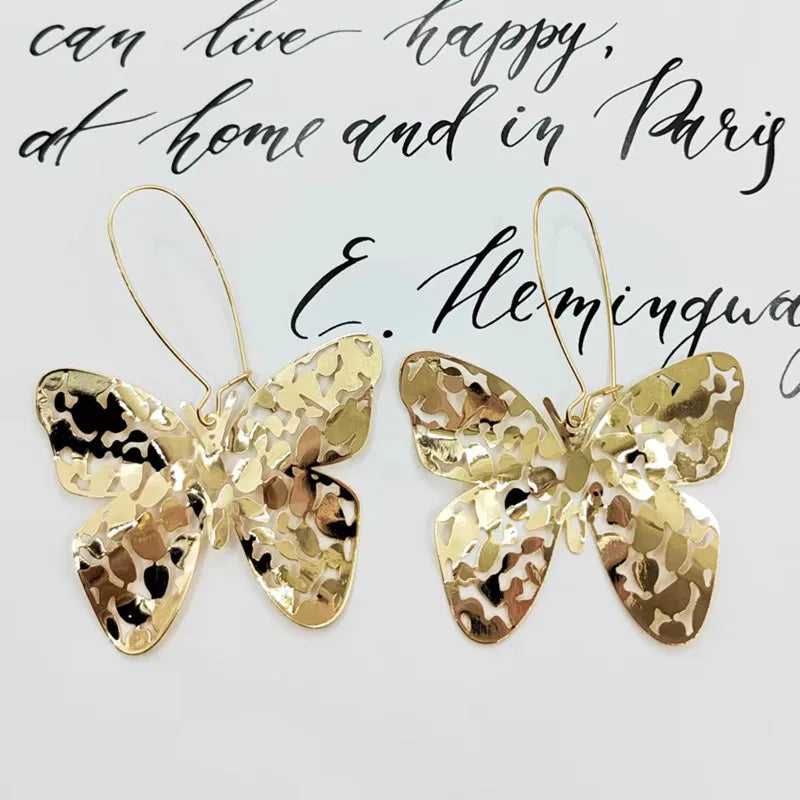 Europe and America exaggerated butterfly earring accessories brass material pressure irregular hollow butterfly earring