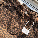 New short skirt 2025 summer American fashion elastic coffee leopard print denim hip skirt hot girl patch small short skirt