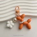 The Koonsian | Faceted Flower-Embedded Acrylic Balloon Dog Keychain
