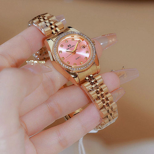 Original Damenuhr Rosa Zifferblatt Goldenes Datum Quarzwerk Vintage Elegante Edelstahluhr Geschenke für Frauen 2024