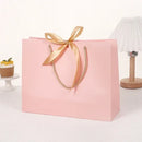 10pcs/lot High Quality Pretty Pink Gift Bag Gift Box Ornament Pajama Book Black Handle With Ribbon Paper Box Bag Kraft Packaging