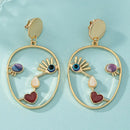 Creative Abstract Face Pendant Earrings For Women Gold-color Hollow Geometric Evil Eye Beads Dangle Earrings Female Jewelry
