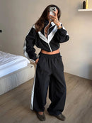 The Axis Set | Contrast-Panel Cropped Jacket and Wide-Leg Trouser Suit