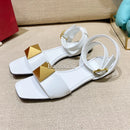 The Rivet Artisan Sandal: Genuine Leather Flat with Statement Buckle