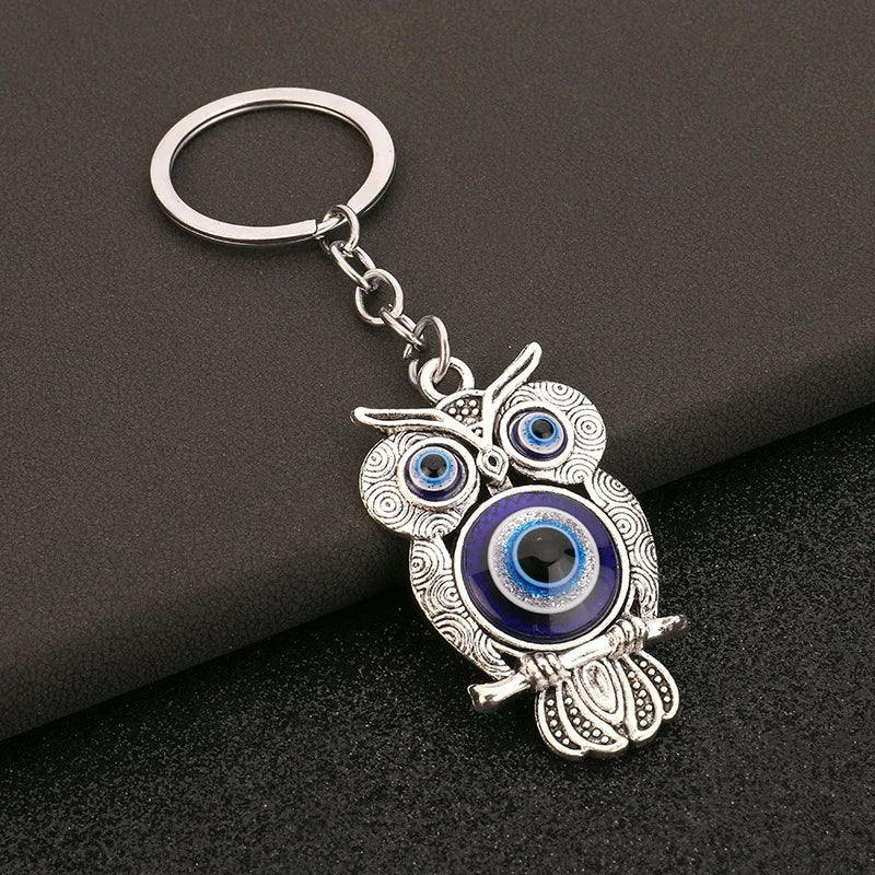 2024 Cross border Hot Selling Environmental Friendly Alloy Blue Eyed Owl Demon Eye Retro Accessories Pendant Keychain