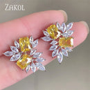 ZAKOL Fashion Yellow Leaf Stud Earrings for Women Shinny Geometry Cubic Zirconia Bridal Earring Wedding Party Jewelry
