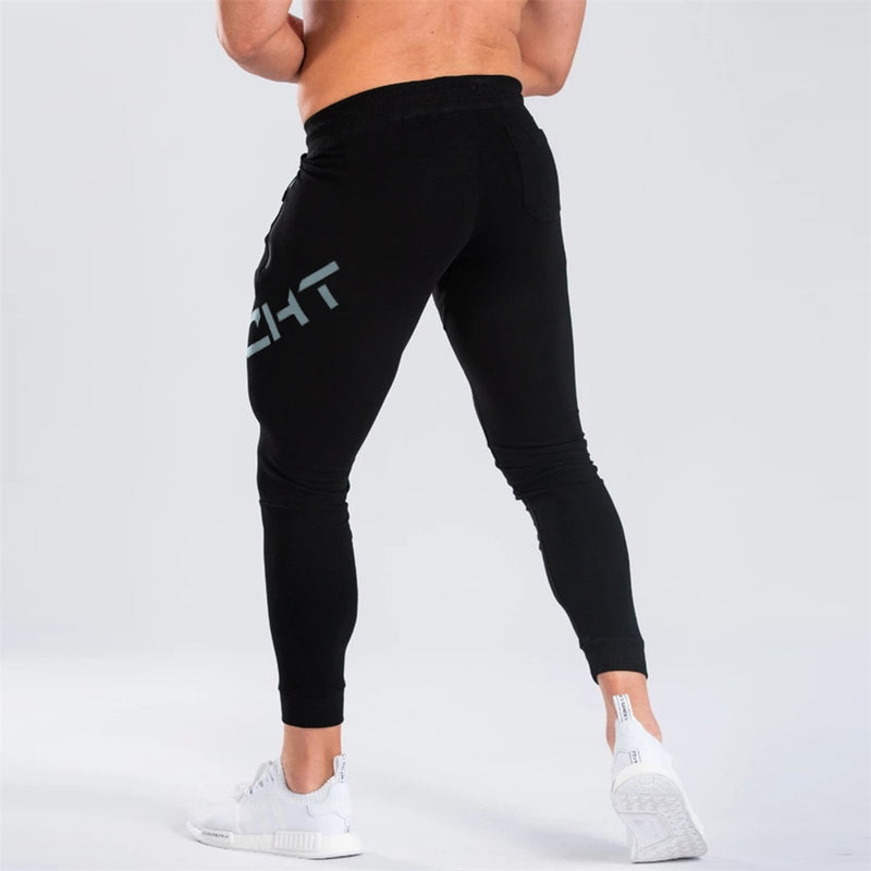 Pantalones de chándal negros para gimnasio, pantalones ajustados para hombre, pantalones casuales para hombre, pantalones de chándal de algodón para entrenamiento físico, ropa deportiva de otoño