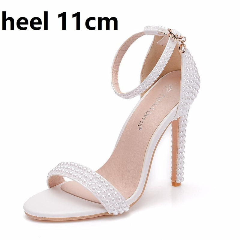 Crystal Queen Novia Zapatos de boda Moda Stiletto blanco Mujer Correa en el tobillo Vestido de fiesta Sandalias Punta abierta Tacones altos Bombas Mujer