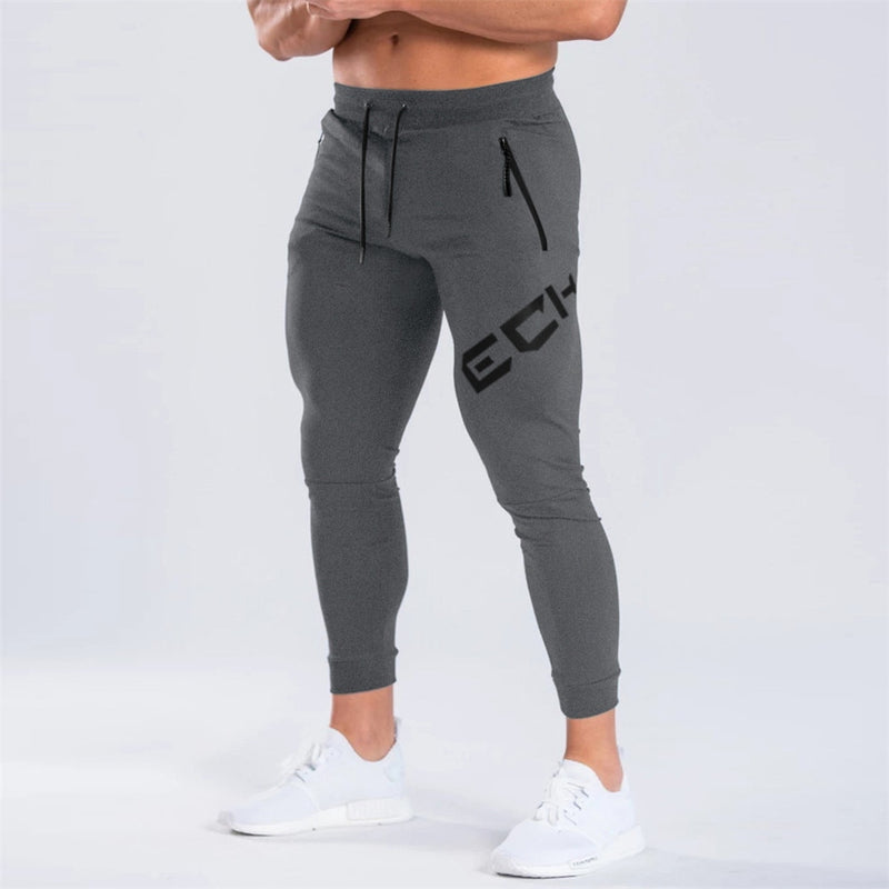 Pantalones de chándal negros para gimnasio, pantalones ajustados para hombre, pantalones casuales para hombre, pantalones de chándal de algodón para entrenamiento físico, ropa deportiva de otoño