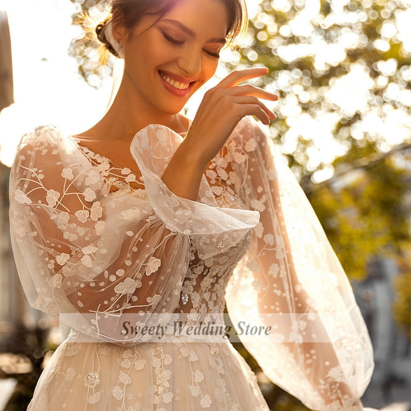 Vestido de novia de encaje de flores románticas Vestidos de novia de princesa Mangas largas Cuello en V Transparente Una línea Vestidos de novia de tren de barrido