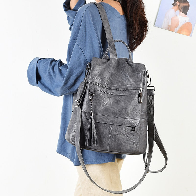 Nuevas mochilas para mujer, bolsos informales con flecos a la moda de cuero suave, bolso de hombro para mujer, mochila escolar de gran capacidad para chicas adolescentes