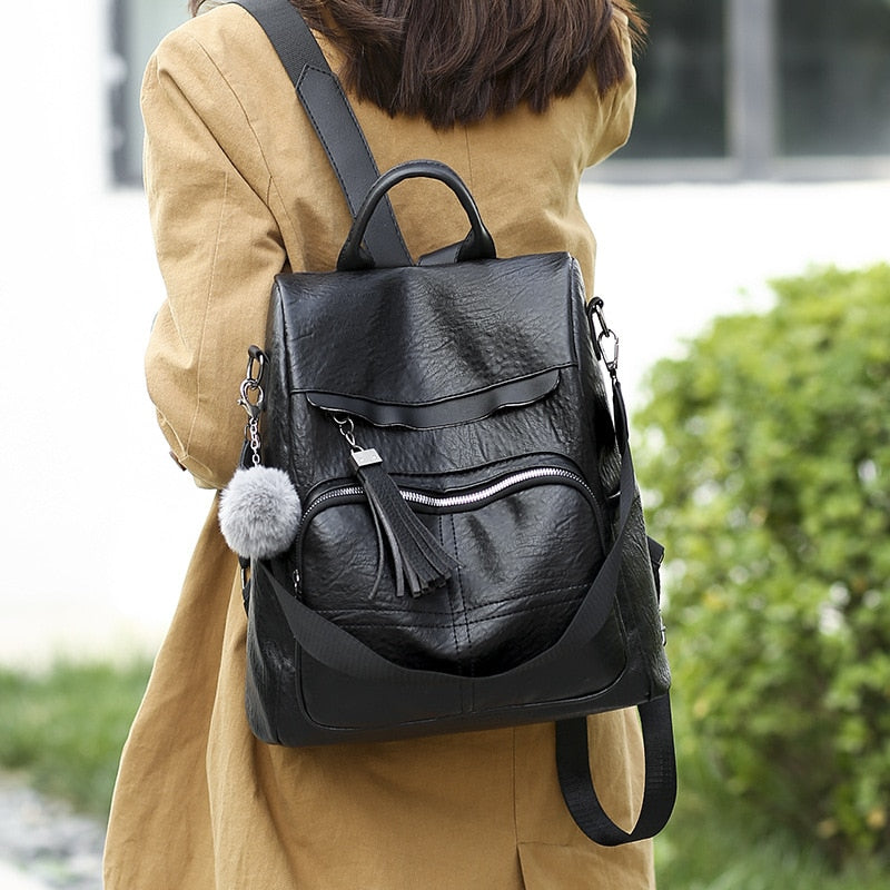 RanHuang nueva llegada 2021 mochila de moda para mujer mochila de cuero suave borla bolsas de viaje mochila escolar para niñas negro A1672