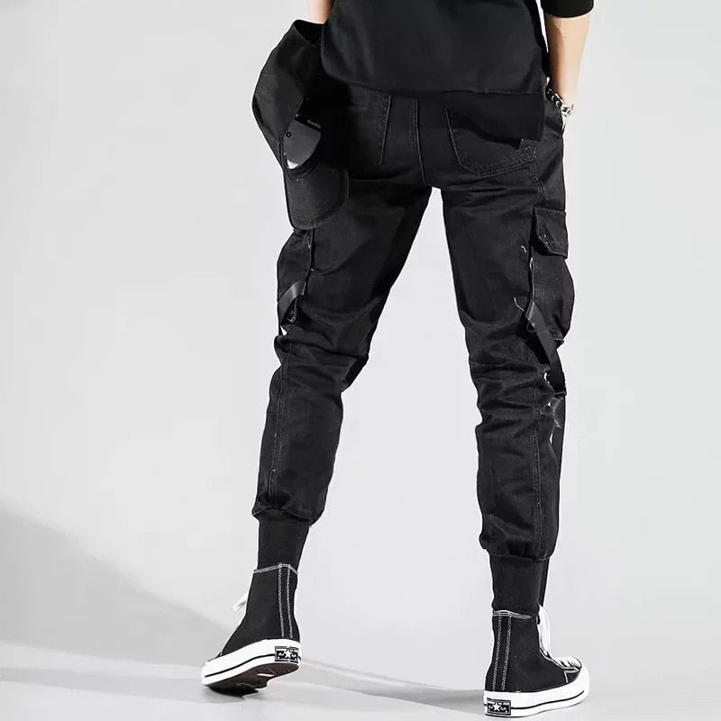 Pantalones bombachos con bolsillos laterales para hombre, otoño 2022, diseño de cintas informales de Hip Hop, pantalones para correr para hombre, ropa de calle de moda, pantalón negro