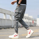 Nuevos pantalones Cargo de algodón con múltiples bolsillos estilo Harajuku para hombre, ropa informal estilo hip hop de otoño, pantalones elásticos informales de camuflaje