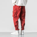 2022 Hombres Multi-bolsillo Cintura elástica Diseño Harem Pant Street Punk Hip Hop Rojo Pantalones casuales Joggers Hombre Ejército Cargo Pantalones 5XL