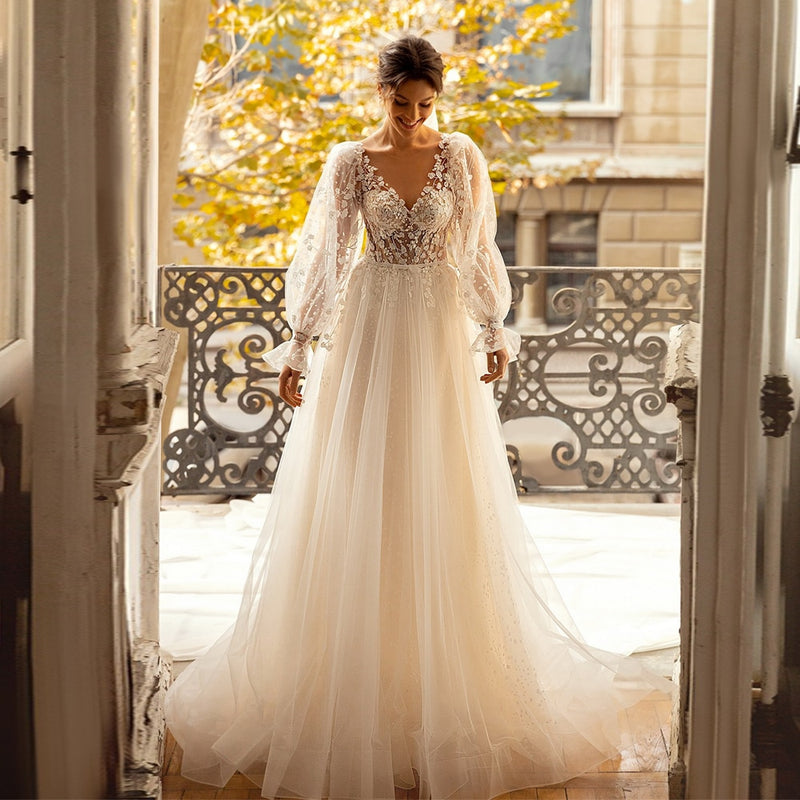 Vestido de novia de encaje de flores románticas Vestidos de novia de princesa Mangas largas Cuello en V Transparente Una línea Vestidos de novia de tren de barrido