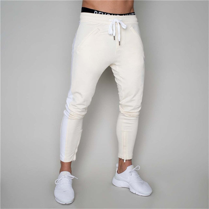 2019 Hombres Joggers Pantalones casuales Fitness Hombres Ropa deportiva Pantalones Pantalones pitillo Pantalones de chándal Pantalones negros Gimnasios Jogger Pantalones de chándal