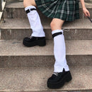 Calentadores de piernas de chica Harajuku blanco sólido Y2k señora hebilla de plástico rodilla dulce calentador de piernas estudiante moda coreana dibujar cuerda calcetín largo