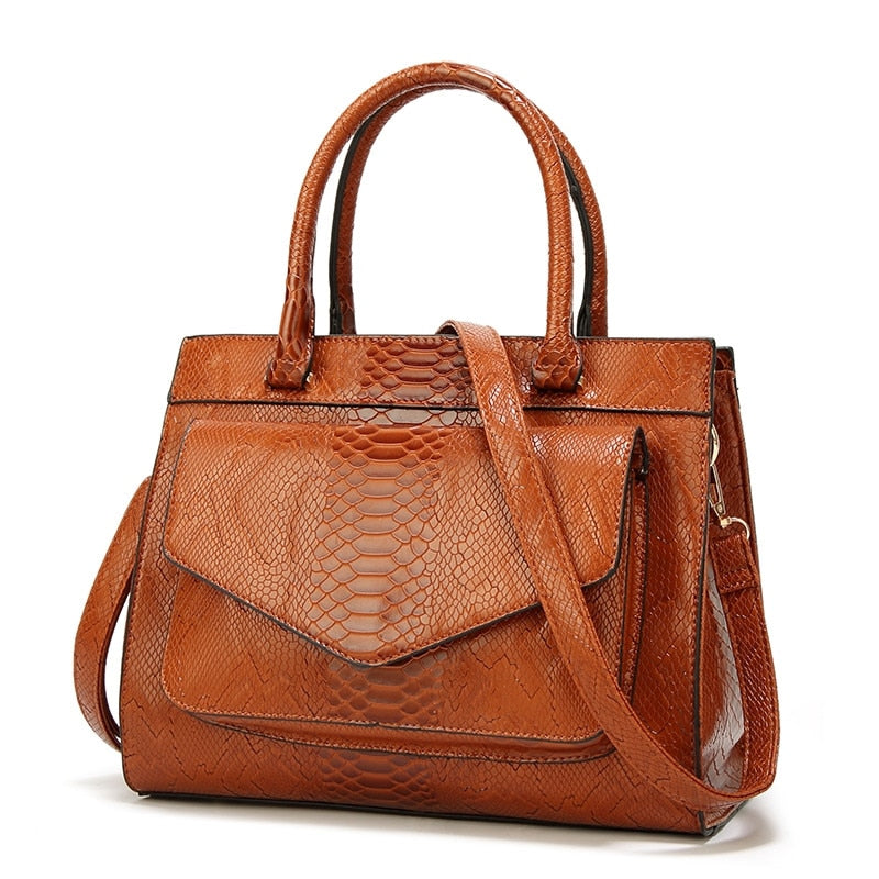 Neue Mode-Frauen-Tasche Luxe cuir Serpentine Damen-Lederhandtaschen mit Beutel Damen Trunk Tote Bolsos Damen-Umhängetasche