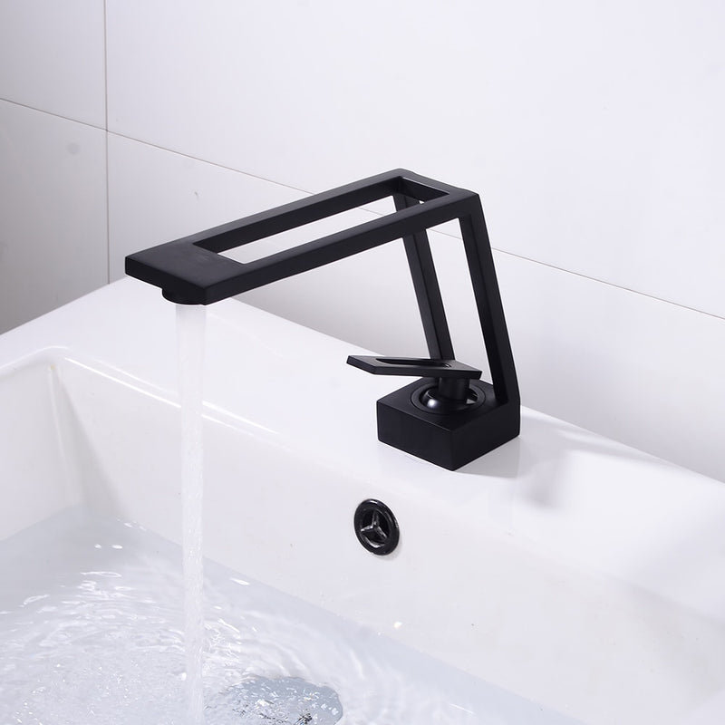 Grifo de baño de lujo Diseño hueco Grifo de lavabo de baño Mezclador de agua fría y caliente Grifo de fregadero Grifo monomando montado en cubierta Grifo negro