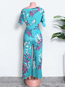 Summer Printed Jumpsuits Irregular Shoulder Sleeves with Sashes Wide Leg Women Floral Vacation Overall Female Bodysuit Big Size