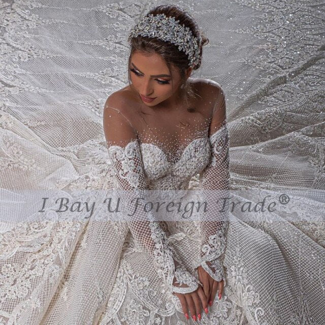 2021 Prinzessin Luxus-Spitze-Hochzeits-Kleid-volle Kristallperle, die lange Hülsen-geschwollene Brautkleider Vestidos De Novia bördelt