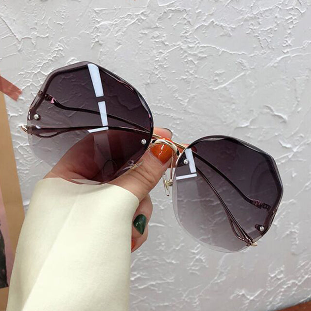 Unregelmäßige runde Sonnenbrillen Frauen Markendesigner Farbverlauf Mode Sonnenbrillen weiblich randlos Metall gebogen Tempel Oculos De Sol