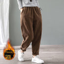 Pantalones cálidos de invierno de terciopelo para mujer, pantalón bombacho de pana con cintura elástica, pantalones holgados sólidos con bolsillos, ropa de calle de gran tamaño para mujer